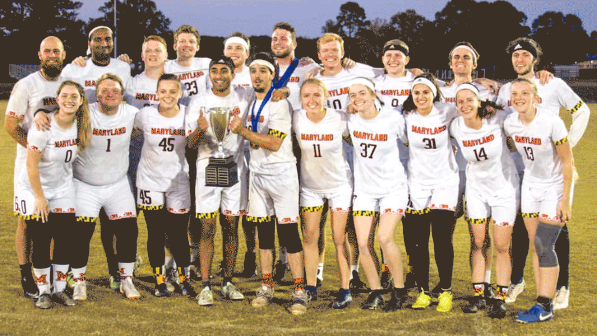 Pixelated GIF of Maryland Quidditch team holding a trophy
