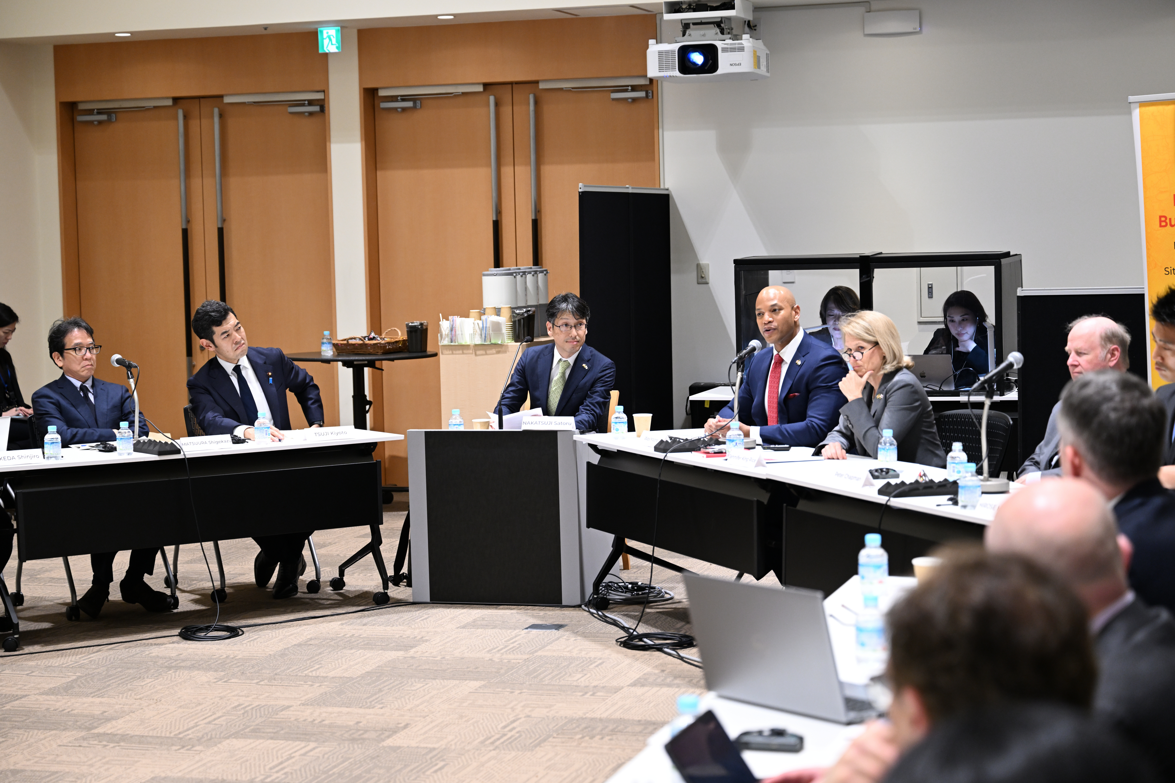 Provost Rice and Governor Moore meet with officials
